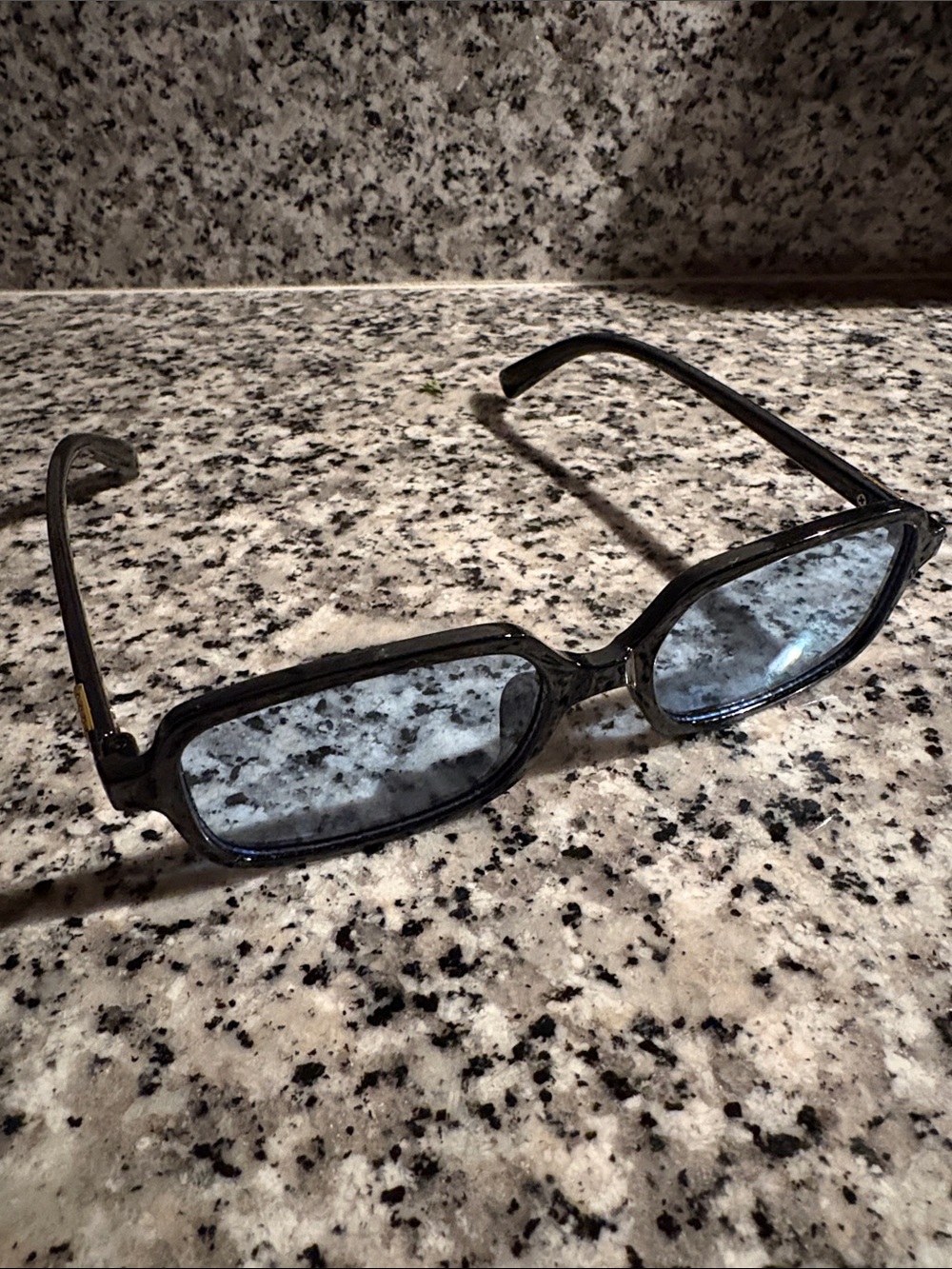 Women’s Black Frame Sunglasses with Blue Lenses